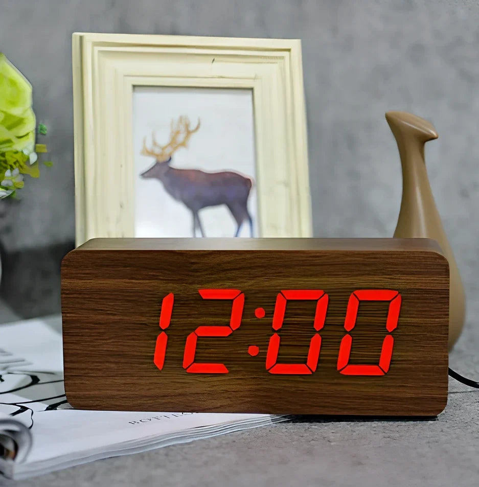 Rectangular wooden alarm clock 21cm long with LED display showing time, date, temperature rotation and voice control buttons