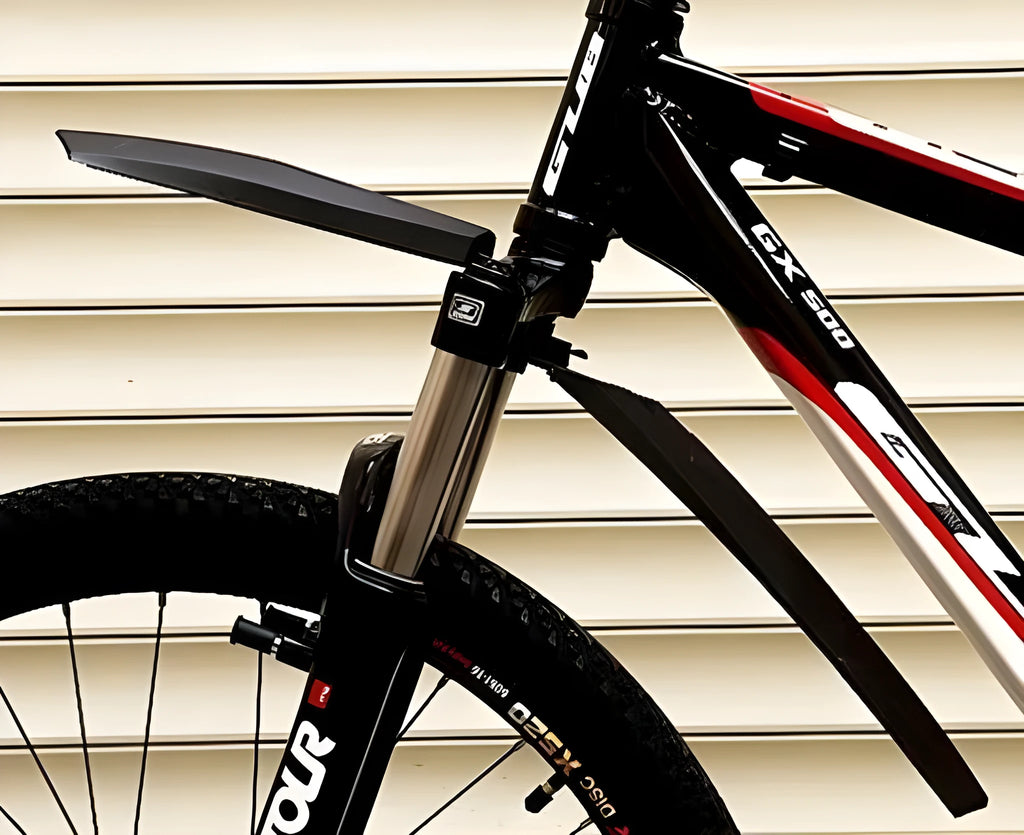 Plastic quick-release bicycle fenders set showing front and rear mudguards in black, blue, green, and red colour options