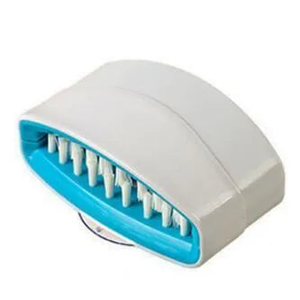 Blue kitchen cleaning brush with suction cup base for washing fruit, vegetables and cutlery.