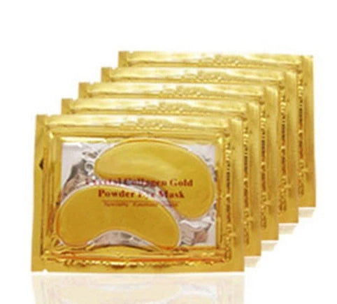 Gold crystal collagen eye patches applied under eyes for dark circle and fine line treatment