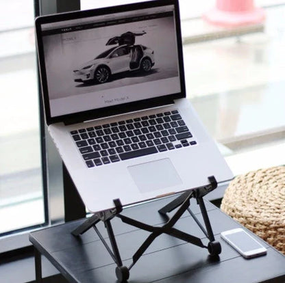 Stylish desktop computer stand with modern, space-saving design to elevate your workstation and boost productivity