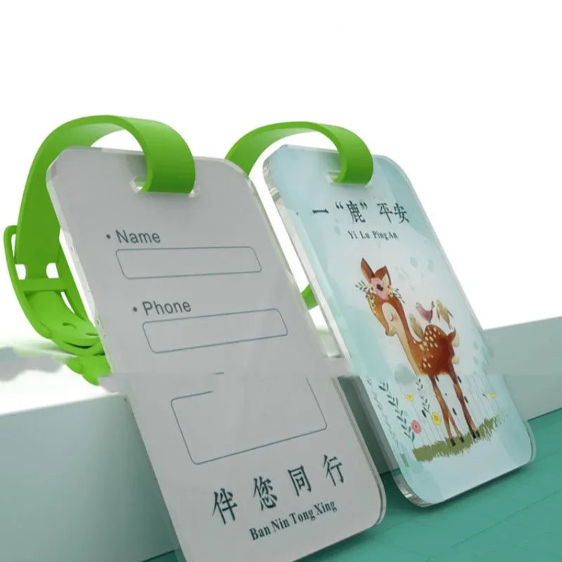 Custom acrylic luggage tag with picture insert, 80x50mm, on a travel suitcase