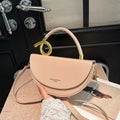 Solid colour PU oval saddle bag with zipper interior in khaki