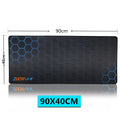 Custom cartoon print large mouse pad on a desk with keyboard and mouse.