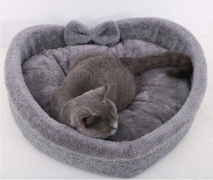 Cozy heart-shaped pet bed in grey and pink colors, designed for small, medium, and large dogs and cats