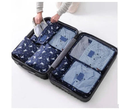 Durable waterproof packing cubes in various colors for organized, efficient travel