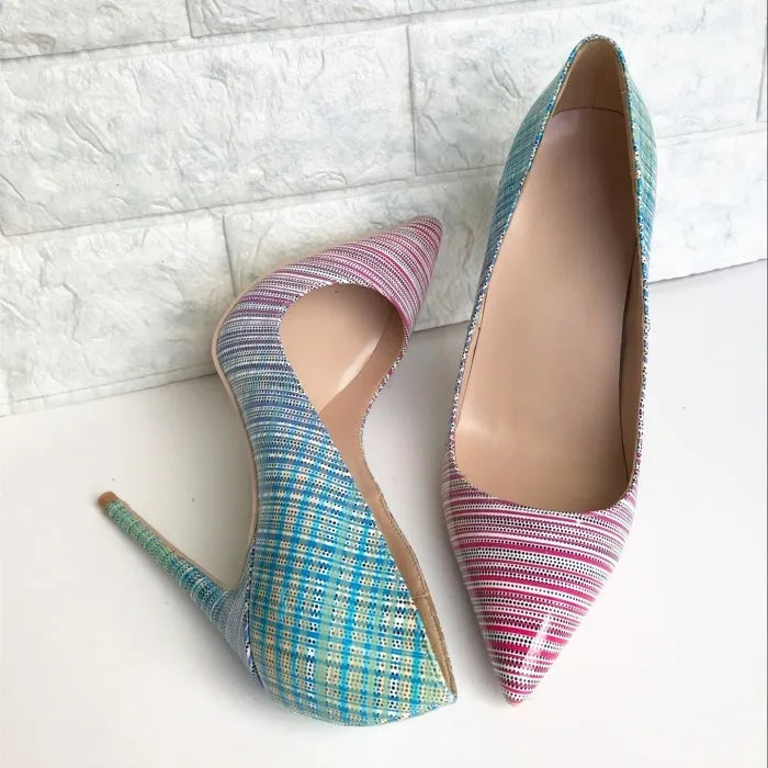 Women's pink and blue gradient patent leather pointed toe high heels on a rubber sole.