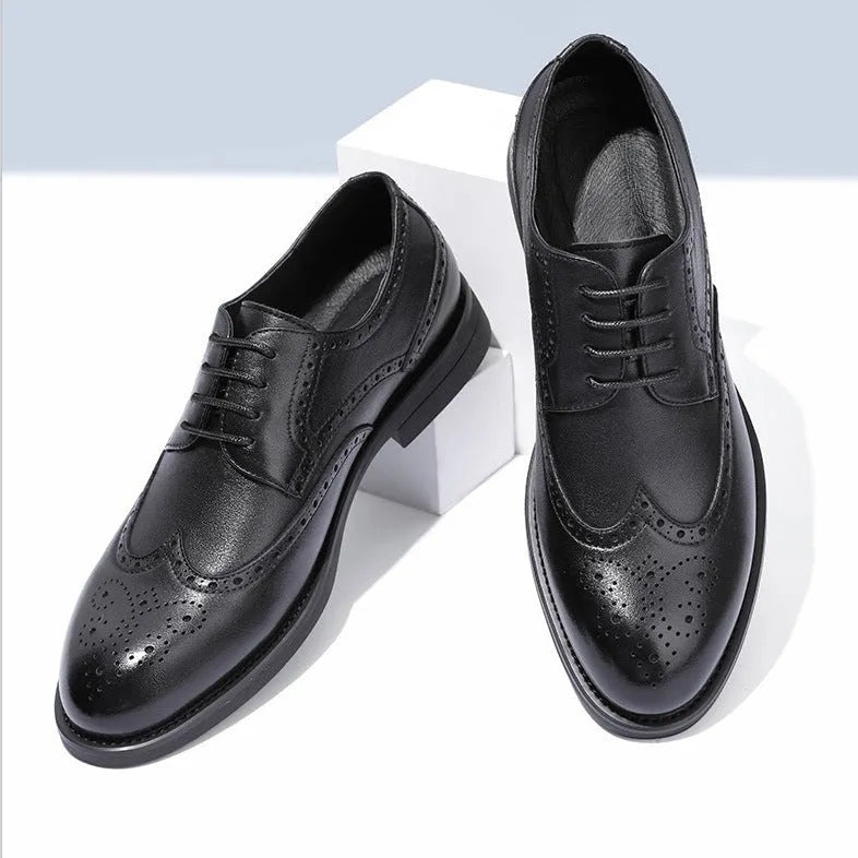 Men's black and brown brogue leather shoes with traditional perforated detailing