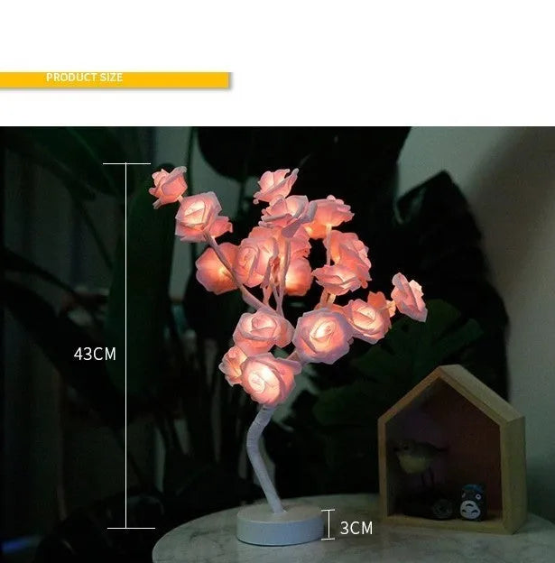 White and red rose flower LED table lamp with warm white lights on wooden surface
