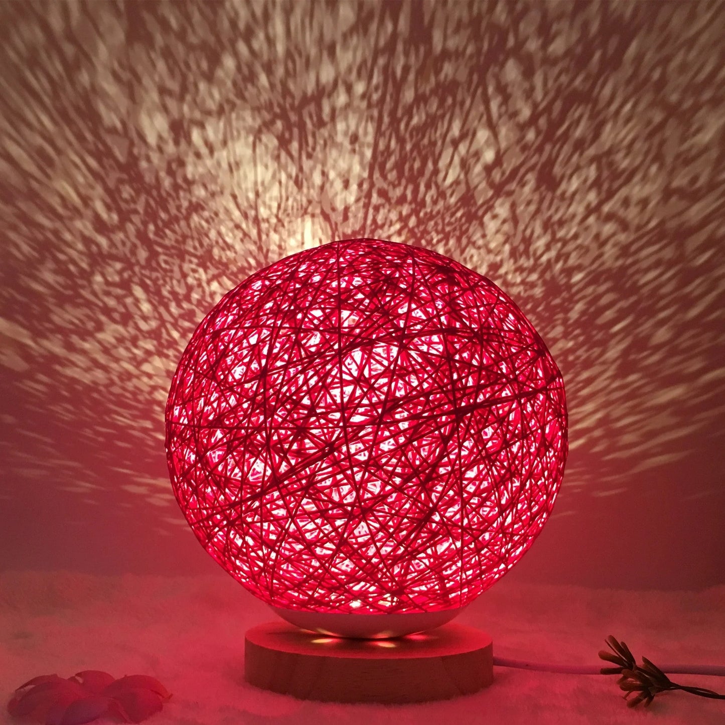 LED rattan table lamp with hand-knit lampshade in various colours