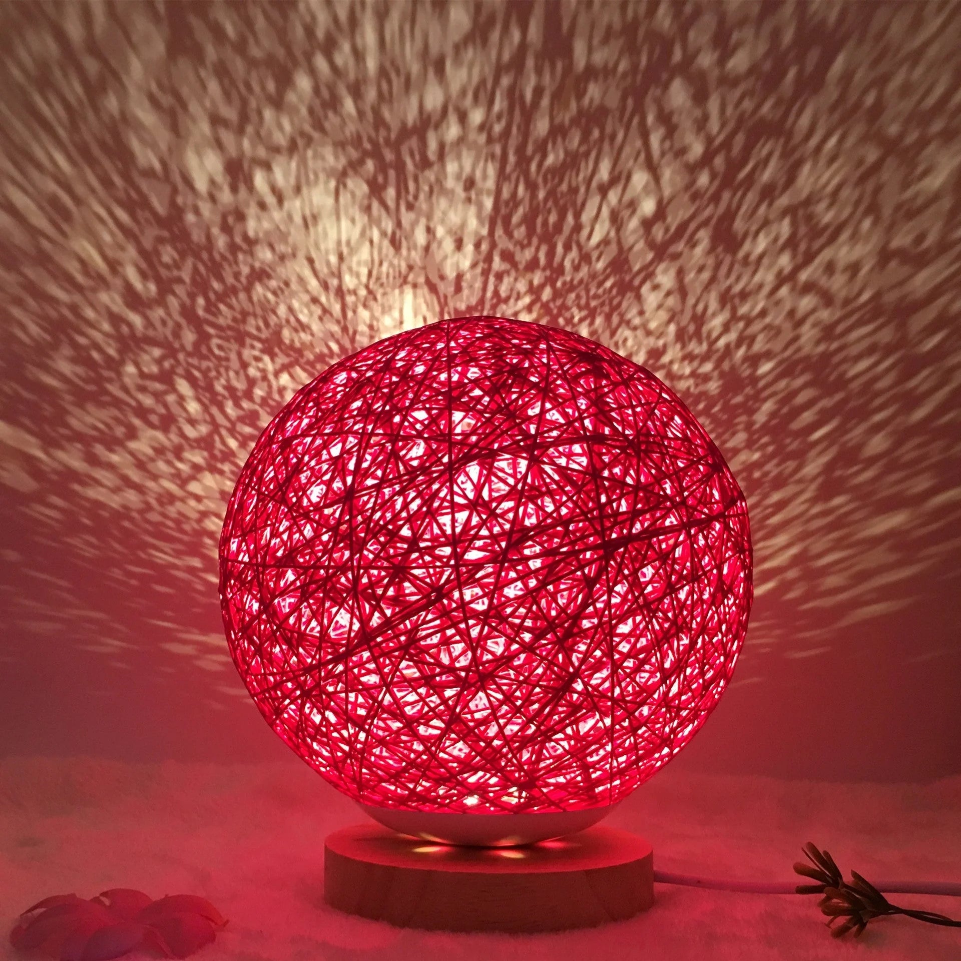 LED rattan table lamp with hand-knit lampshade in various colours