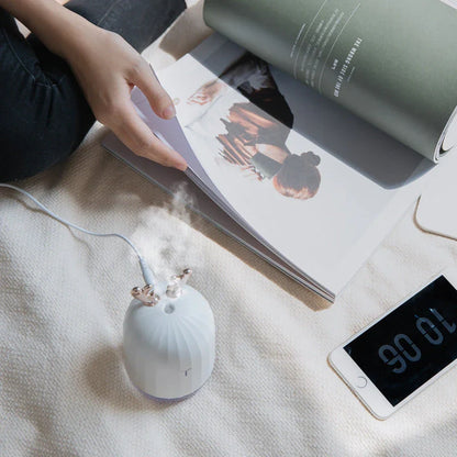 Mini humidifier in deer shape with USB charging, perfect for small spaces