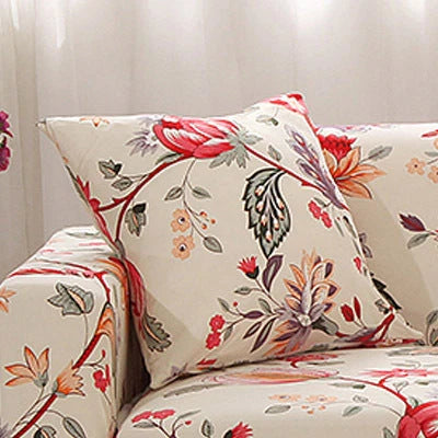 Printed stretchable sofa slipcover covering a three-seater sofa in a modern geometric pattern