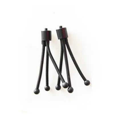 Compact silver metal mini tripod with ball head, shown folded next to an iPhone for scale.