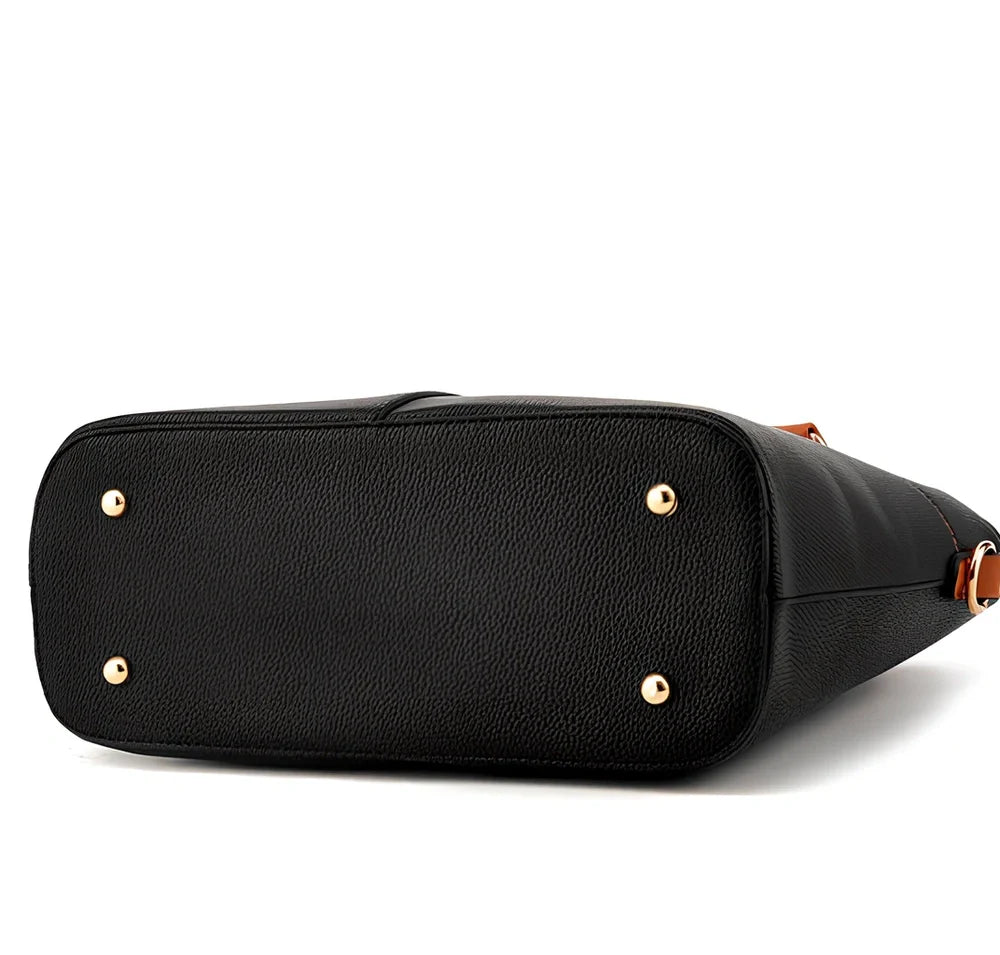 Women's black PU slung shoulder bag, 25cm height, adjustable strap for diagonal carry with phone and wallet inside