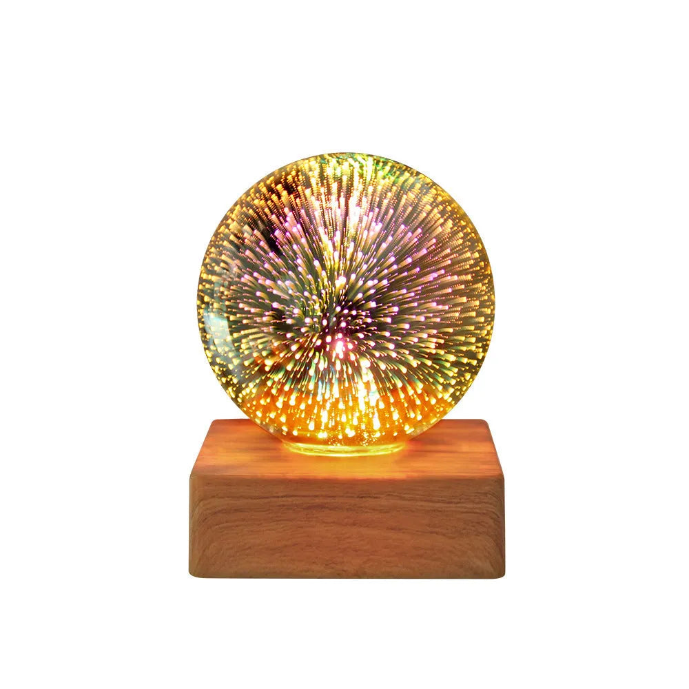 Spherical USB touch control LED night light showing starry sky pattern on a desk.