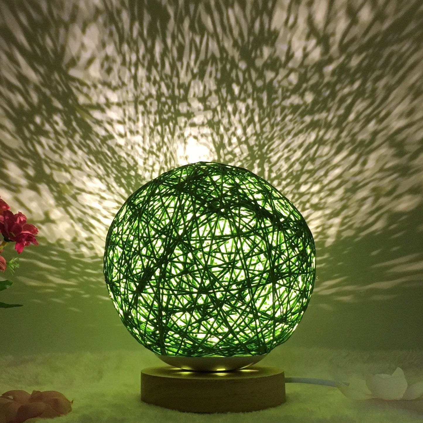 LED rattan table lamp with hand-knit lampshade in various colours
