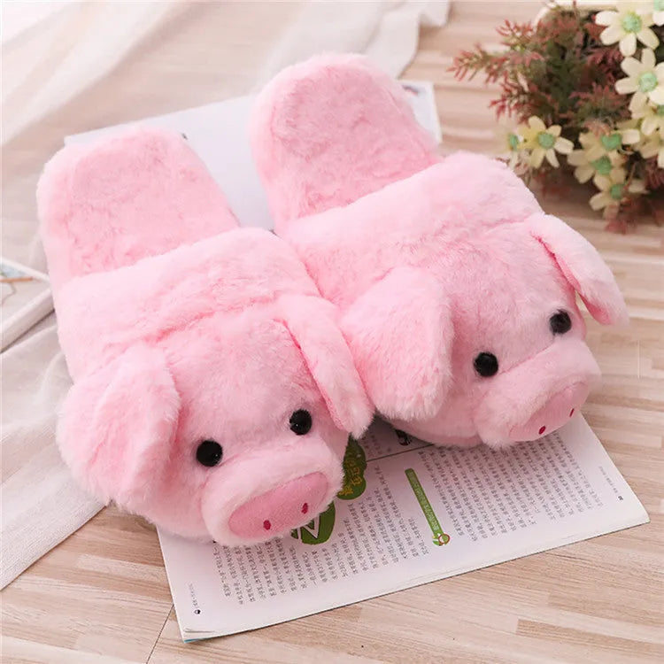 Pink pig-themed floor slippers with short plush exterior.