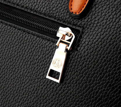 Women's black PU slung shoulder bag, 25cm height, adjustable strap for diagonal carry with phone and wallet inside