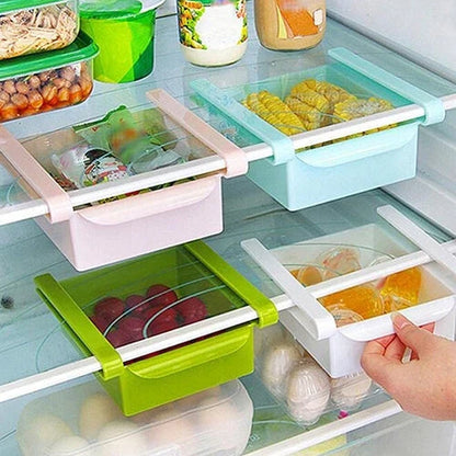 A versatile fridge organiser made of durable plastic with a clever drawer design for easy storage and access in the kitchen.