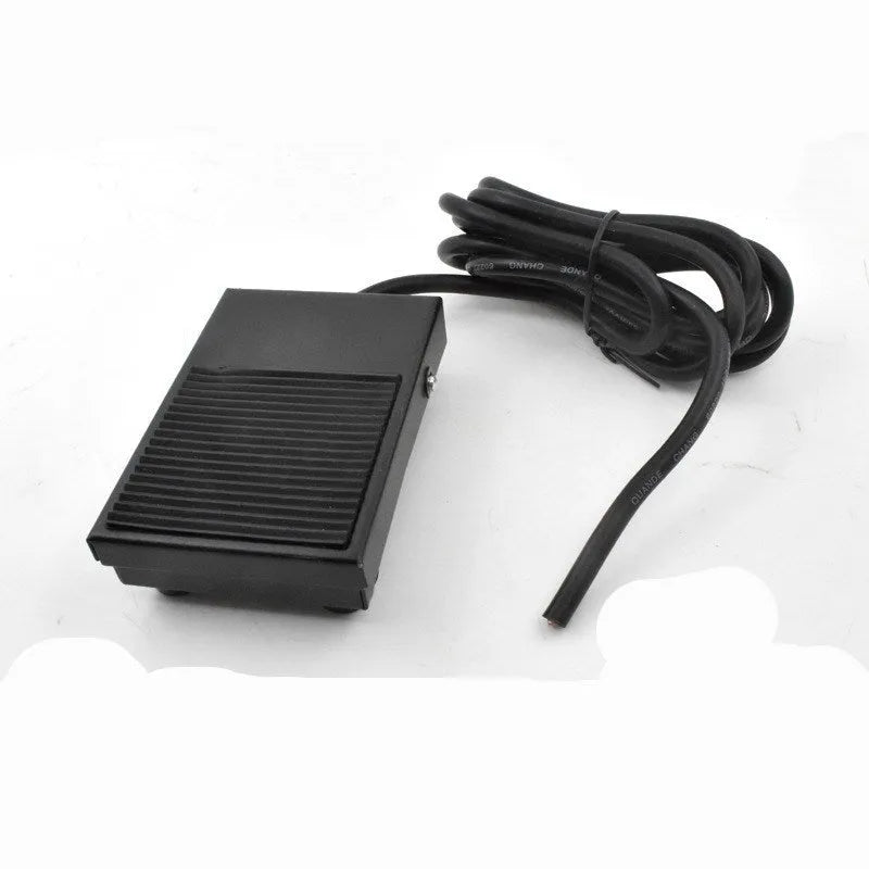 Metal welding foot switch pedal with black rubber top and a 1.8 metre long grey cable attached