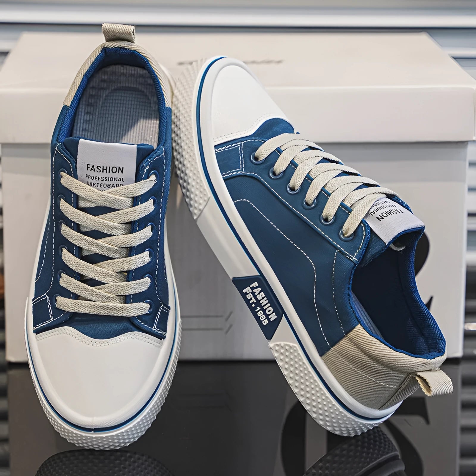 Men's blue canvas casual shoes with round toe and lace-up front, showing PVC sole detail