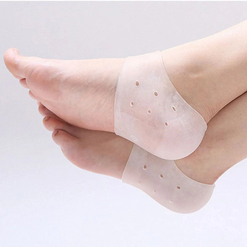 Perforated silicone heel protector in white, showing medical-grade material and breathable design