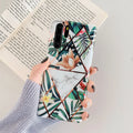 Huawei phone case with white floral lattice pattern on a coloured TPU PC back cover.