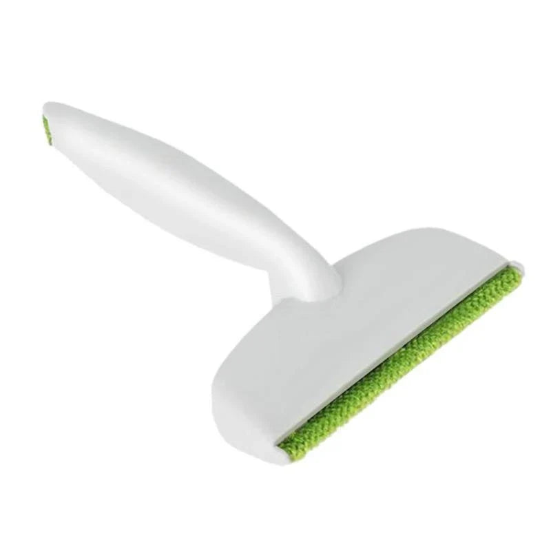Green plush duster cleaning brush for sofa and pet hair removal
