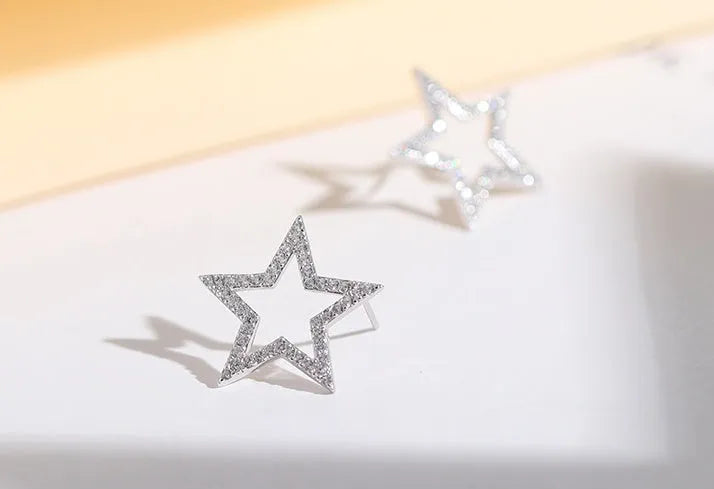 S925 sterling silver micro-inlaid five-pointed star stud earrings, Korean style, for women on a white background