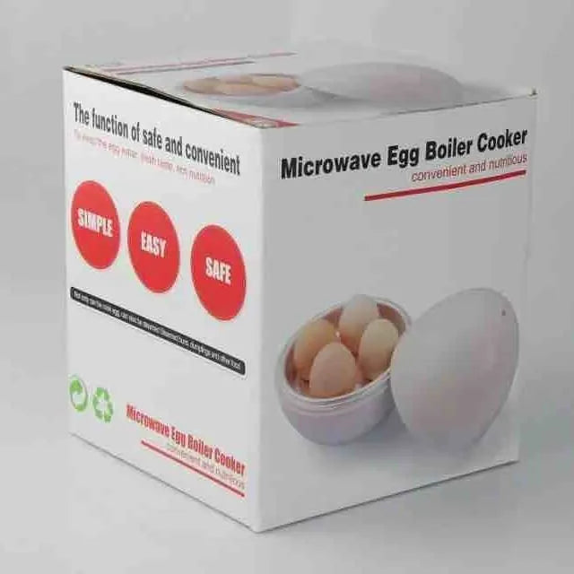 White microwave egg steamer cooker with lid, showing capacity for four eggs on a kitchen counter.