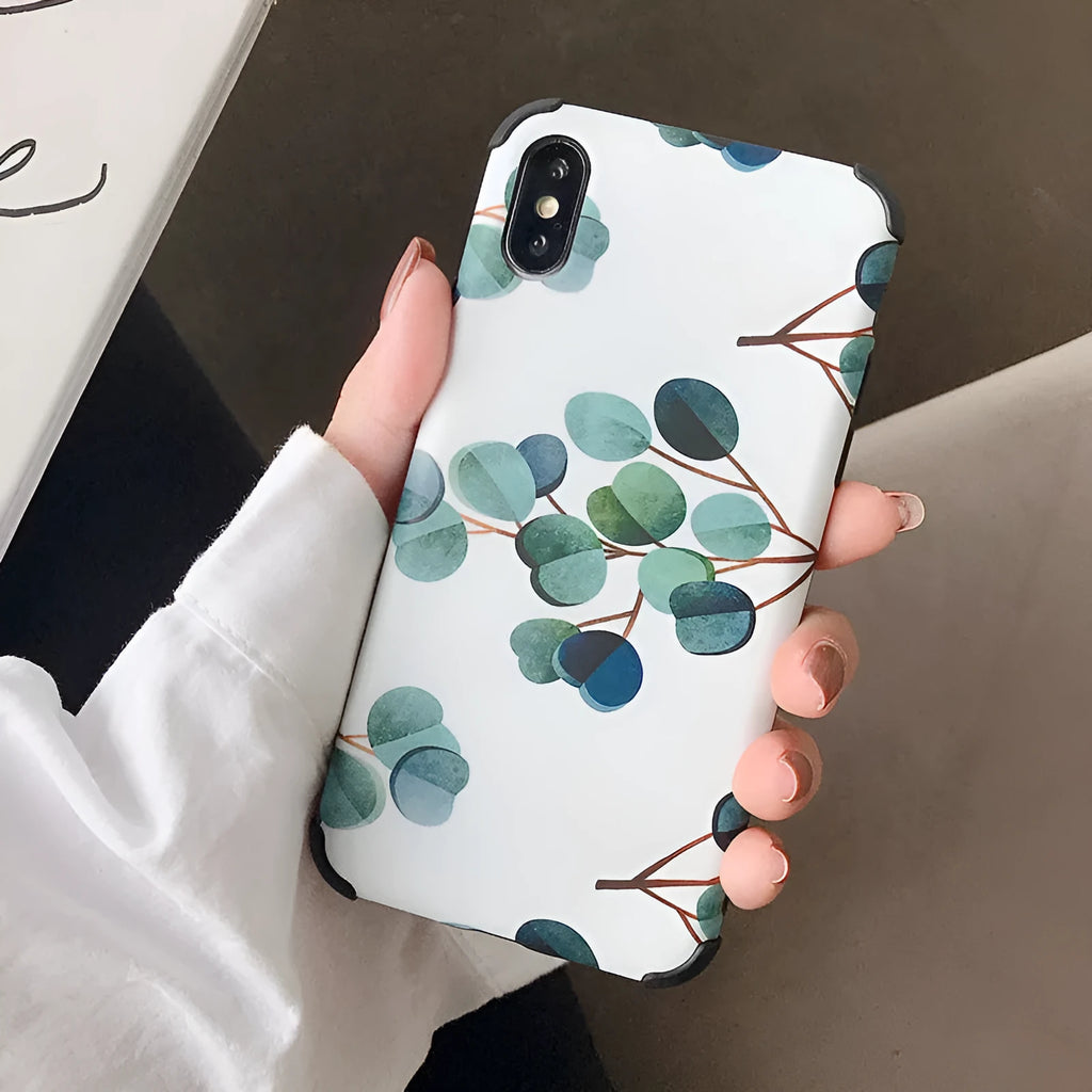 White silicone gel back cover for Apple iPhone with retro floral pattern and four-corner drop protection