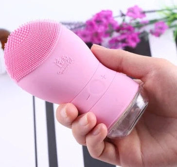 Blue ceramic plant pot with integrated water reservoir and drainage holes for indoor plants