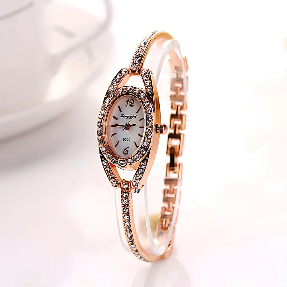 Silver-toned women's quartz bracelet watch with 25mm round dial, 185mm strap, and slim 7mm case for everyday wear