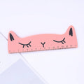 Creative cat-shaped wooden ruler measuring 13 cm in pink colour on white background