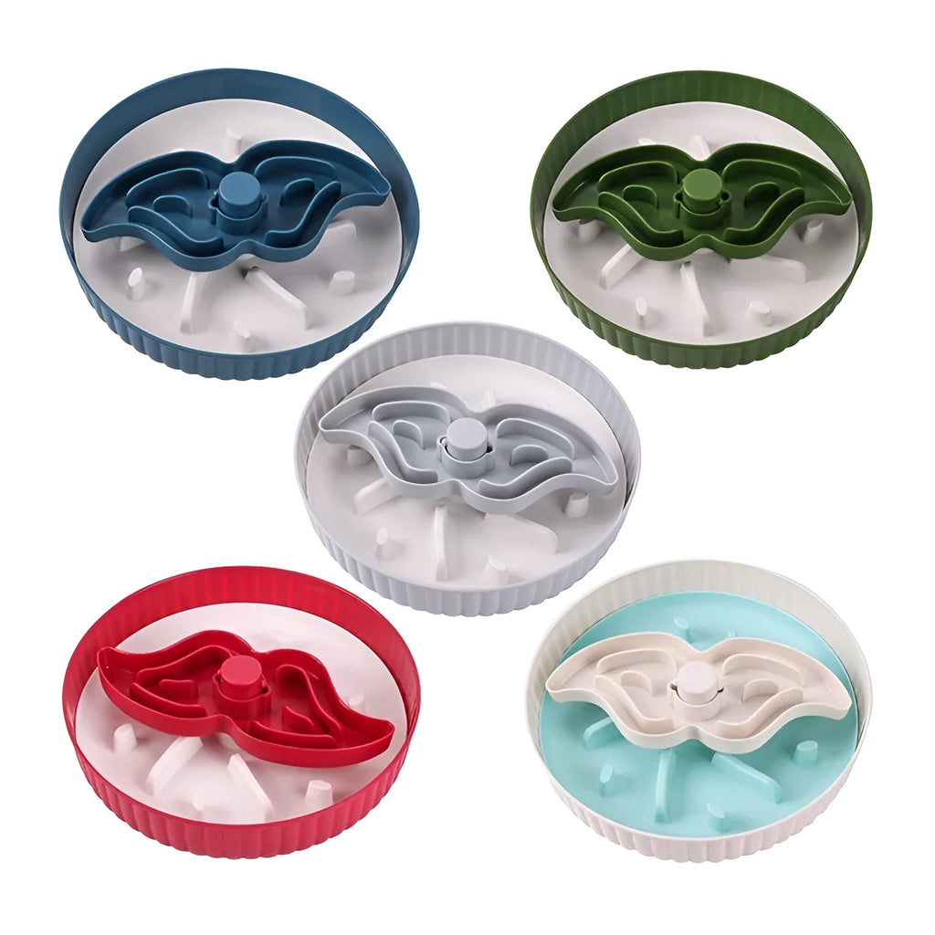 Rotating plastic pet food bowl with a blue silicone slow feed licking mat insert in a windmill pattern.