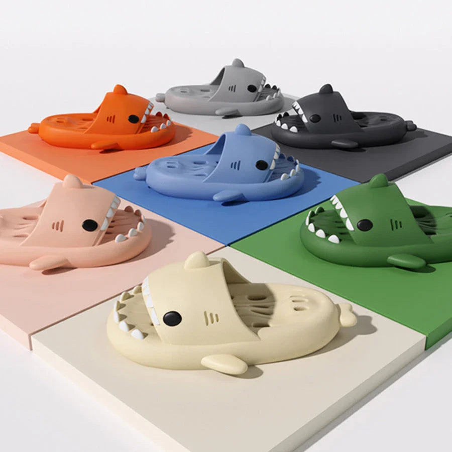 Shark-themed shower slides with drainage holes for women, featuring a realistic design, comfortable EVA material, and anti-slip features.