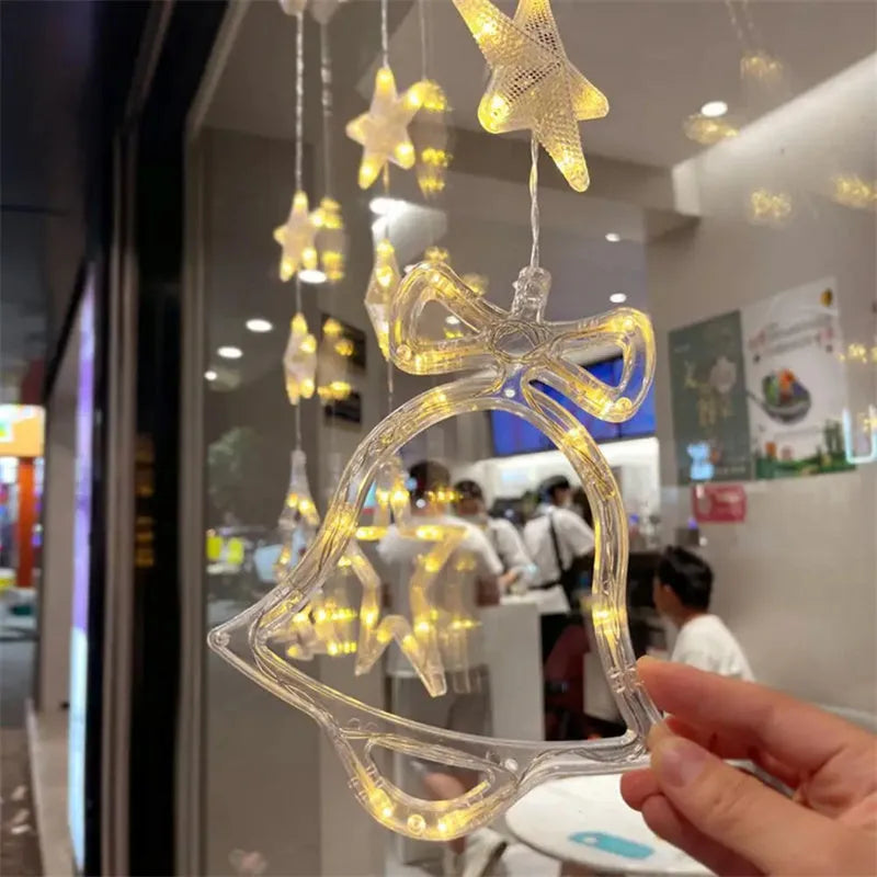 Set of three battery-powered LED Christmas pendant lights with suction cups for window decoration