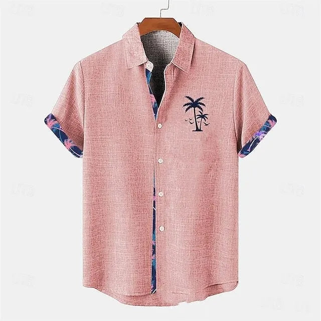 Man's light blue linen short-sleeve shirt with a colourful ocean fish pattern print on the front.