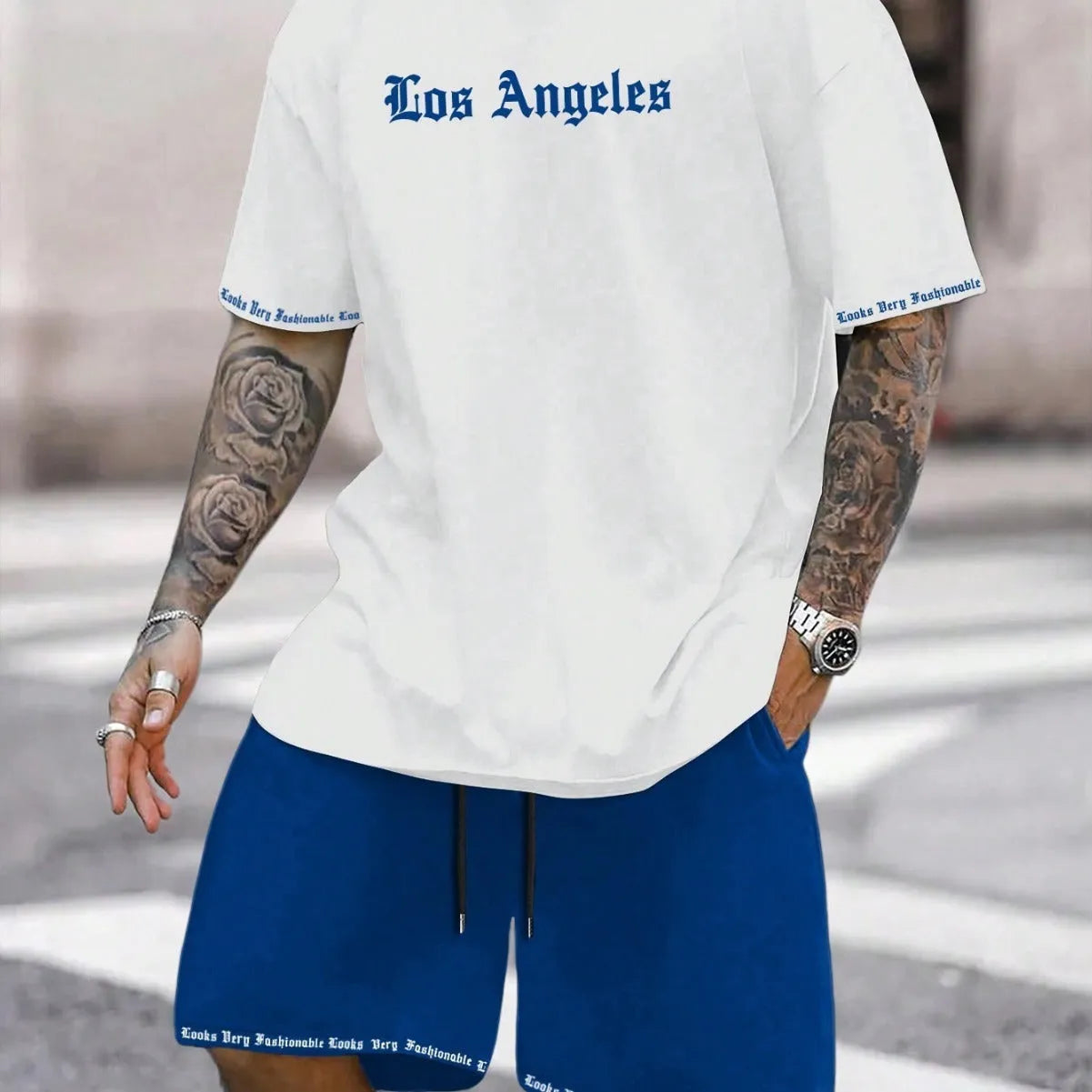 Men's sports style short-sleeved suit set with matching shorts in polyester blend fabric