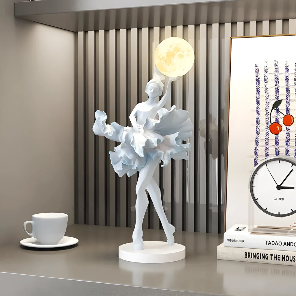 Resin ballet girl small night lamp in pink finish on tabletop