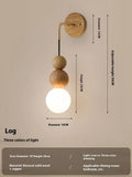 Wood and copper wall lamp with lollipop shade and tri-colour light for bedside or living room.