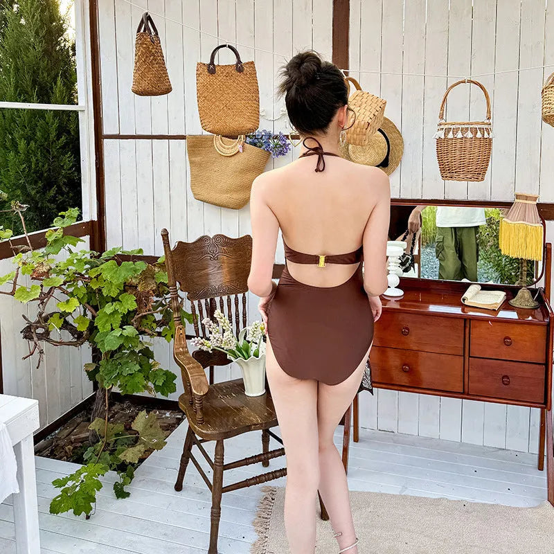 Simple retro one-piece swimsuit for women in polyester fibre, available in M L XL, colour as shown