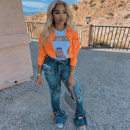 Orange cropped women's denim jacket with lapel collar, long sleeves 46cm, pockets, length 41cm, 0.35kg weight