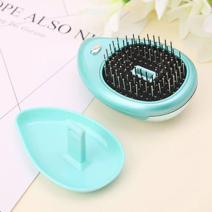 Portable negative ion hair comb with sound wave vibration technology in pink and green
