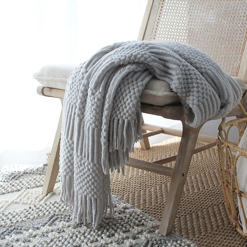 Nordic knitted bubble blanket in light grey on a modern sofa, 127x170cm polyester acrylic throw