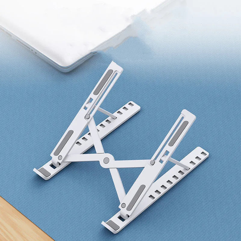 Black folding laptop cooling base showing 10 adjustable height positions on desktop