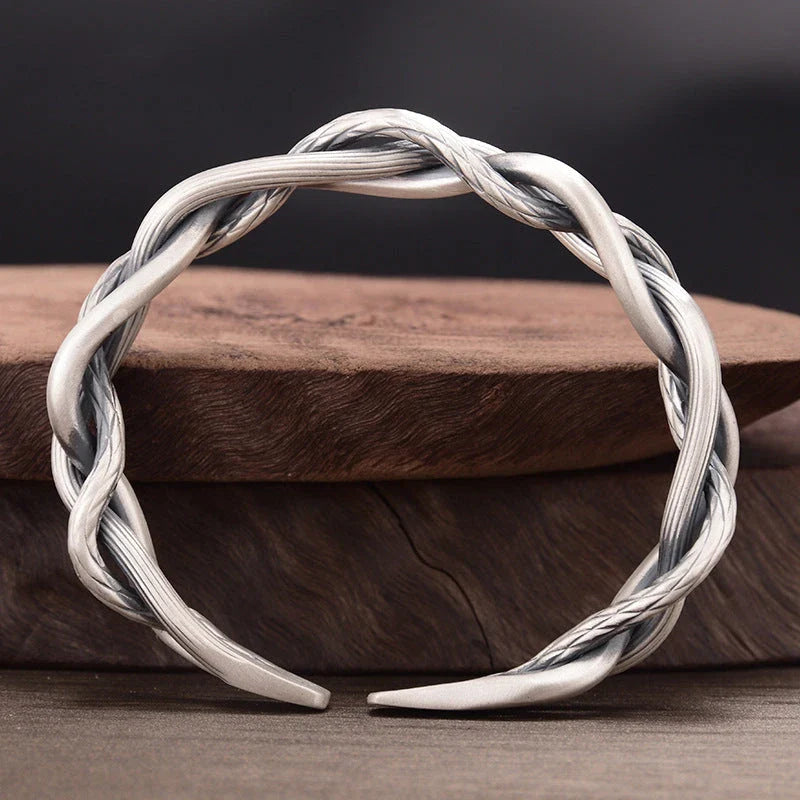 Sterling silver retro three-strand twist bracelet with adjustable opening