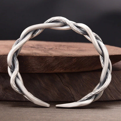 Sterling silver retro three-strand twist bracelet with adjustable opening