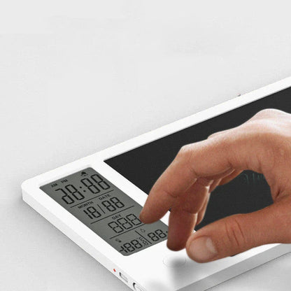 Electronic calendar writing board displaying time, temperature, and humidity on an LCD screen